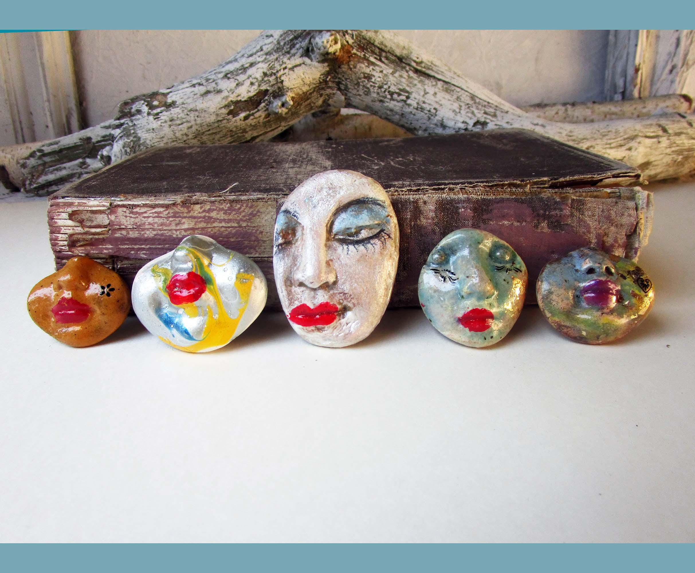handmade ceramic faces set of five different unique faces.