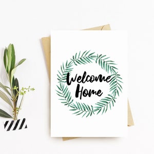 Carte de vœux bienvenue à la maison