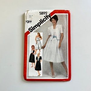 May include: Vintage Simplicity sewing pattern number 5892 for a skirt and jacket. The pattern is for size 10 miss and costs £3.00.