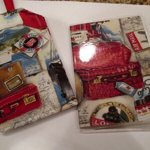May include: Two fabric passport holders with a travel theme. The larger holder has a red, white, and blue star with the words "Star Line First Class" and "The of Your" printed on it. The smaller holder has a red, white, and blue star with the words "Star Line First Class" printed on it.