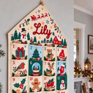 May include: A cream-colored fabric wall-hanging advent calendar shaped like a house, featuring the name Lily in red script. It has twelve numbered pockets decorated with Christmas motifs like a snowman, bear, reindeer, and gifts.