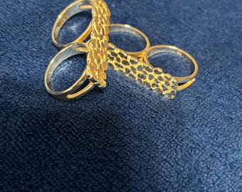Gold nugget two finger rings.