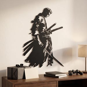 May include: A black metal wall art silhouette depicting a standing swordsman with spiky hair, wearing a traditional robe and carrying three swords. The figure is shown in profile, looking downward with a focused expression, rendered in a flat, cutout style.