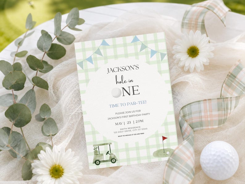 May include: A rectangular invitation card featuring a light green and white checkered pattern with blue bunting flags. The text reads Jackson's hole in ONE, TIME TO PAR-TEE!, and includes party details. Graphics include a golf cart and a golf flag.