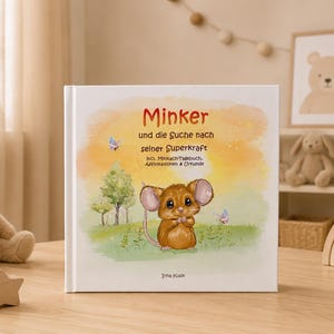 May include: A hardback children's book titled Minker und die Suche nach seiner Superkraft, featuring a watercolour illustration of a brown mouse in a green field with trees, butterflies, and a yellow sky. The author name Irina Kusik is printed.