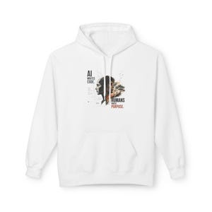 May include: White hoodie with a front graphic. The graphic shows a person's profile and the text "AI writes code. Humans write purpose."