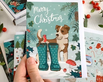 Merry Christmas Card Featuring Dog Greets Robin on Wellies