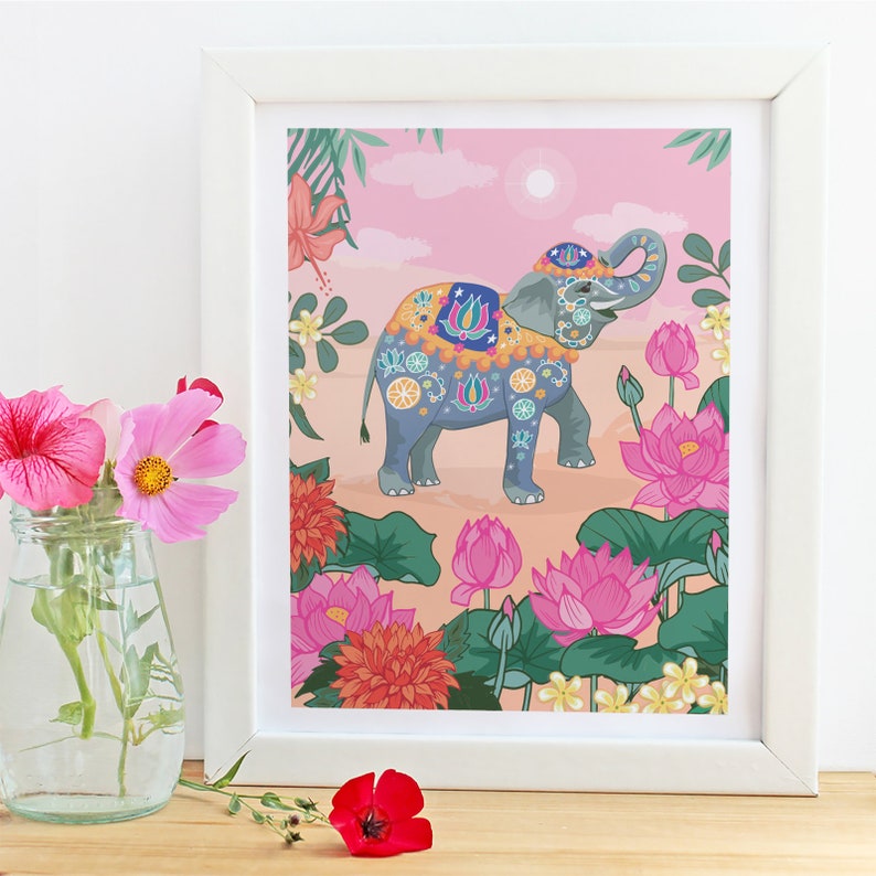 May include: A colorful illustration of an elephant decorated with floral patterns and standing in a field of pink lotus flowers. The elephant is surrounded by lush green foliage and a pink sky.