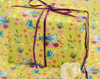 Chartreuse gift wrapping paper with bluebirds and spring flowers