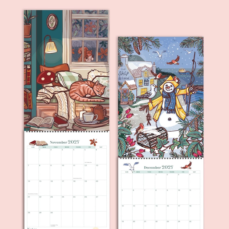 May include: A 2027 wall calendar featuring two pages for November and December. November shows a cozy indoor scene with a cat, books, and a lamp. December depicts a snowy coastal village scene with a snowman, birds, and a building labeled The Ship Inn.