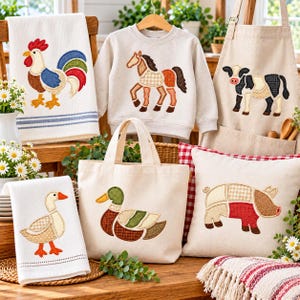 May include: A collection of textile items featuring farm animal appliques: a white towel with a rooster, a beige sweatshirt with a horse, a beige apron with a cow, a white towel with a goose, a beige tote bag with a duck, and a beige pillow with a pig.