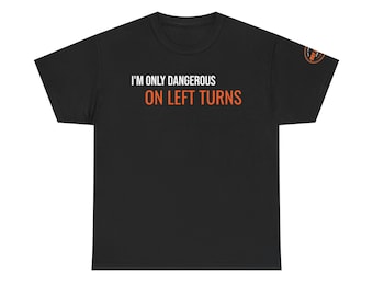 May include: A black short-sleeved t-shirt featuring the white text I'M ONLY DANGEROUS and the orange text ON LEFT TURNS printed on the chest. A small circular orange and black logo is visible on the upper left sleeve of the garment.