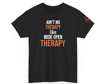 May include: Black t-shirt with the text "AIN'T NO THERAPY like WIDE OPEN THERAPY" in white and orange. The shirt has a crew neck and short sleeves. A small circular logo is on the right sleeve.
