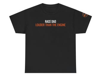 May include: A black short-sleeve t-shirt featuring the white text RACE DAD and the orange text LOUDER THAN THE ENGINE centered on the chest. A small circular orange and black logo is printed on the edge of the left sleeve.