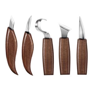 May include: A set of five wood carving tools featuring silver-toned metal blades and dark brown wooden handles. The collection includes various blade shapes, such as straight, curved, and hook-style tips, designed for detailed woodworking tasks.
