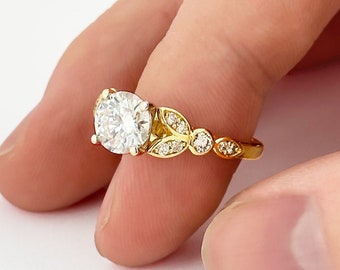 Unique Leaf Design Engagement Ring with a Round Cut Moissanite Stone in 14k Yellow Gold