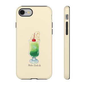 May include: A phone case with a cream-colored background featuring a watercolor illustration of a melon soda. The drink has a green gradient, topped with whipped cream and a cherry. The text "Melon Soda" is below the drink.