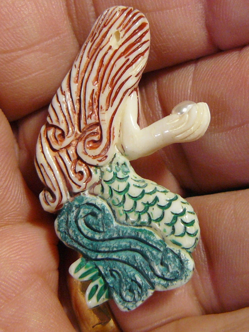 hand carved in India drilled hole. Carved bone Mermaid jewelry supply em53191