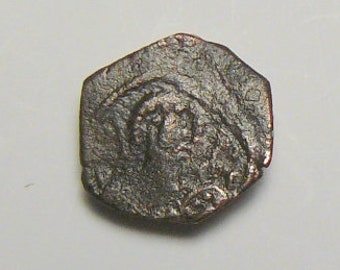 Ancient Byzantine coin, Manuel I, Comnenus. 1143-1180 AD.  1/2 Tetarteron,  1.8 grams. 16 mm (c5621)