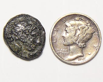 Rare Herakles coin facing right wearing lion's skin headdress, reverse eagle standing right facing left,  336-323 BC. 14-16 mm, 3.3 g. (c13)