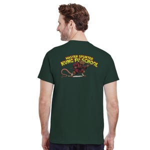 May include: Dark green t-shirt featuring a cartoon illustration of Master Splinter from Teenage Mutant Ninja Turtles. The graphic shows Splinter in a red gi, holding a weapon, with the text "MASTER SPLINTER KUNG FU SCHOOL" in yellow and red.