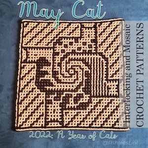 May include: A square, crocheted pattern in shades of brown and tan, featuring a cat design. The text "May Cat" is at the top, with "Interlocking and Mosaic Crochet Patterns" on the right side. The text "2022: A Year of Cats" is at the bottom.