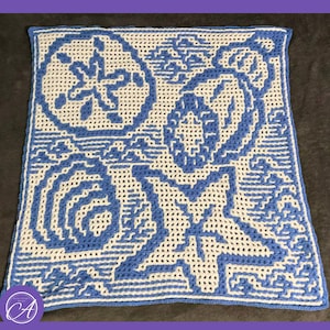 May include: A square, crocheted blanket featuring a sea life design in white and blue. The blanket showcases a starfish, seashell, and sand dollar pattern. The border is blue, and the overall design is reminiscent of the ocean.