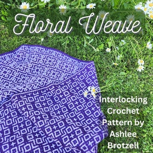 May include: A purple and white crocheted blanket with a geometric pattern. The blanket is laid out on a bed of green grass with white flowers. The text "Floral Weave Interlocking Crochet Pattern by Ashlee Brotzell" is visible in the image.