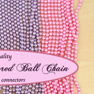 May include: Four strands of 1.5mm petite colored ball chain, each 24 inches long with connectors. The chains are pink, turquoise, purple, and light pink.