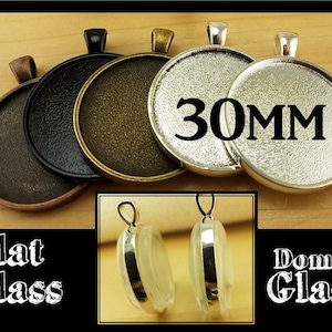 May include: Four silver-toned pendant trays with a 30mm diameter. Two trays are flat and two trays are domed. The trays are for crafting and jewelry making.