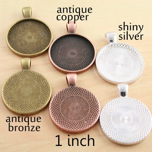 May include: Six 1-inch round metal blanks for jewellery making. The blanks are in antique copper, antique bronze, shiny silver, and copper.