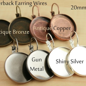 May include: Four pairs of 20mm leverback earring wires in antique bronze, antique copper, gun metal, and shiny silver.