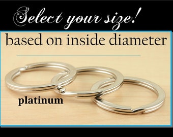 May include: Three silver key rings of different sizes, with the text "platinum" below them.  Select your size! based on inside diameter.