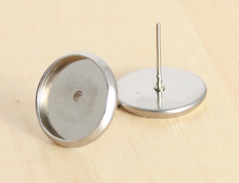 Optional Glass 12 pair and Seals No Tarnish offered. - Blank Bezel 24 24 or 48 24 ct 14mm STAINLESS Steel Earring Stud Bezel Settings.