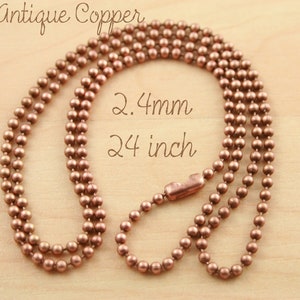 May include: Antique copper ball chain necklace, 2.4mm in diameter, 24 inches long.