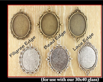100 Decorative Edge OVAL Pendant Trays - 30mm x 40mm Oval. Bronze, Antique Silver. Photo 1 shows 3 designs options.
