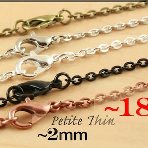 May include: Four different chain styles in gold, silver, black, and copper. Each chain is approximately 18 inches long and 2 millimeters thick. Petite Thin ~18' ~2mm