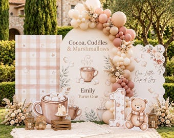 May include: A birthday party backdrop featuring an arched sign with the text Cocoa, Cuddles & Marshmallows, Emily Turns One, and Our Little Cup of Joy. It includes a balloon garland, a number one cutout, a teddy bear, and cocoa mug graphics.