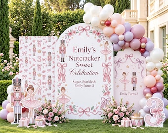 May include: A party backdrop display featuring three white panels with nutcracker and ballerina illustrations, pink bows, and the text Emily's Nutcracker Sweet Celebration. Includes a balloon arch, floral arrangements, and a number 3 sign.