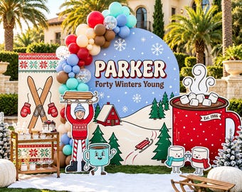 May include: A winter-themed party backdrop featuring a large blue arch with the text PARKER Forty Winters Young, surrounded by a balloon garland, a red mug cutout with marshmallows, a person cutout, and a wooden sled on the grass.