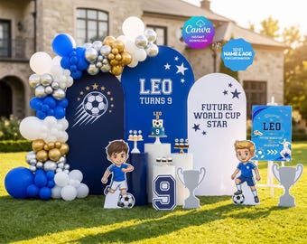 May include: A soccer-themed birthday party setup with blue, white, silver, and gold balloons. The decorations include a sign that says "LEO TURNS 9" and "FUTURE WORLD CUP STAR". There are also cutouts of soccer players and trophies.