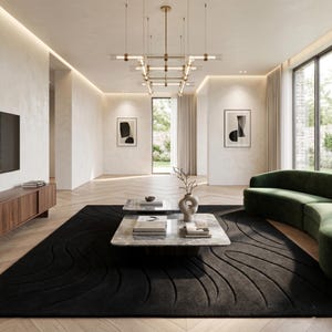 May include: A modern living room with a black rug featuring a wave pattern, two marble coffee tables, and a green curved sofa. The room has a wooden floor, white walls, and large windows. A modern chandelier hangs from the ceiling.
