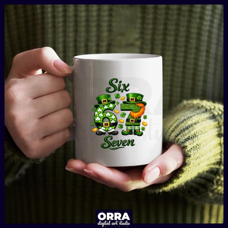 May include: White ceramic mug featuring a St. Patrick's Day design. The mug displays the words "Six Seven" with a green number six and a leprechaun figure. The design includes shamrocks and gold coins. The mug is held by a person.