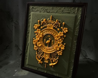 May include: A rectangular framed wall art piece featuring a dark olive green textured background with a raised, golden-yellow relief sculpture. The central design depicts a flamingo standing inside a circular frame surrounded by intricate floral motifs.