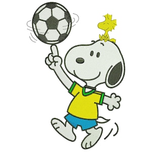 May include: An embroidered image of Snoopy balancing a soccer ball on his finger. Snoopy is wearing a yellow jersey with green trim and blue shorts. Woodstock is perched on Snoopy's head. The soccer ball is black and white.