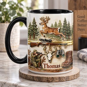 May include: A white ceramic mug with a black handle and interior featuring a hunting-themed graphic. The design includes a leaping deer, a rifle, a kneeling hunter, a deer skull, binoculars, a brown boot, and the name Thomas in brown text.