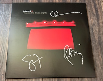 Interpol – TURN On THE BRIGHT LiGHTS-vinylplaat – gesigneerd door kunstenaar