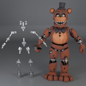 May include: A brown bear animatronic figure wearing a black top hat and bow tie, featuring a weathered texture with exposed mechanical joints and wires. Beside the figure are several detached silver-colored metal robotic limb components.