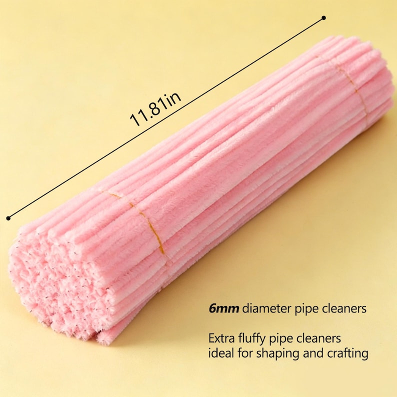 May include: A bundle of light pink pipe cleaners with a fuzzy texture. The bundle measures 11.81 inches in length and features individual pipe cleaners with a 6mm diameter. The text 6mm diameter pipe cleaners and Extra fluffy pipe cleaners are visible.