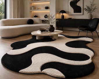 Tappeto moderno astratto in lana nero avorio, tappeto trapuntato a mano dalla forma irregolare, tappeto contemporaneo per soggiorno.